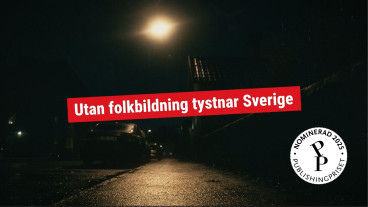 En gata i kvällen. Utan folkbildning tystnar Sverige står på över bilden